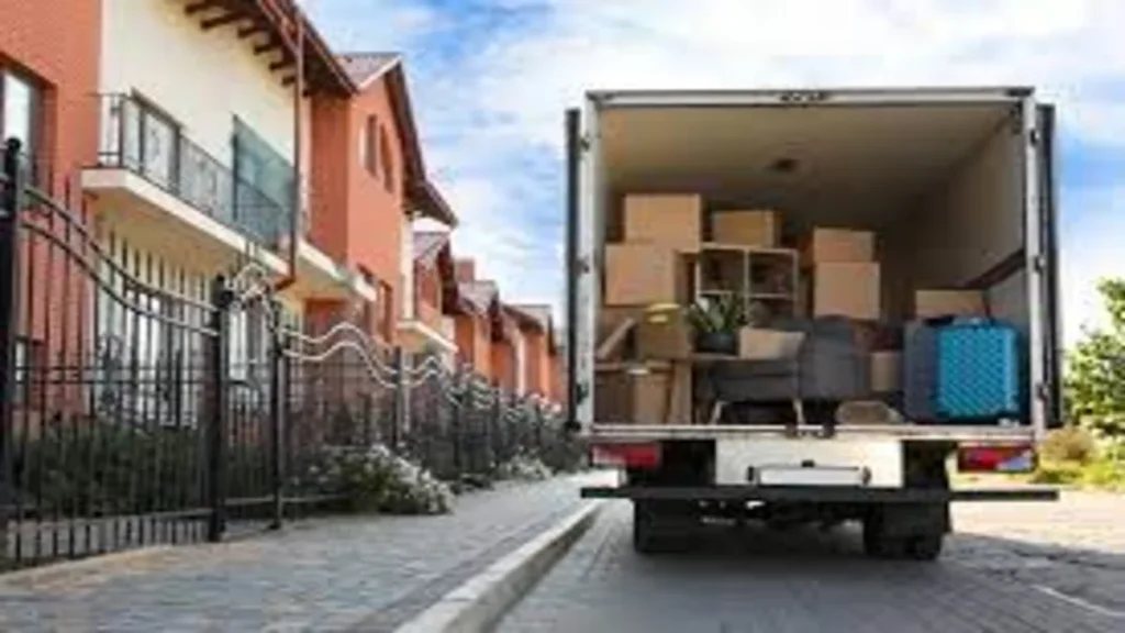 Tiger Mover team loading boxes into a moving truck in Abu Dhabi