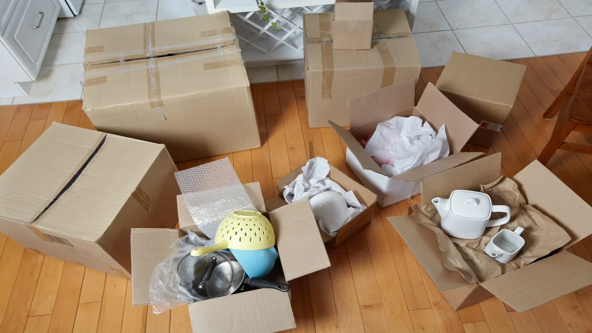 Carefully packed kitchen utensils and glassware by Tiger Mover team