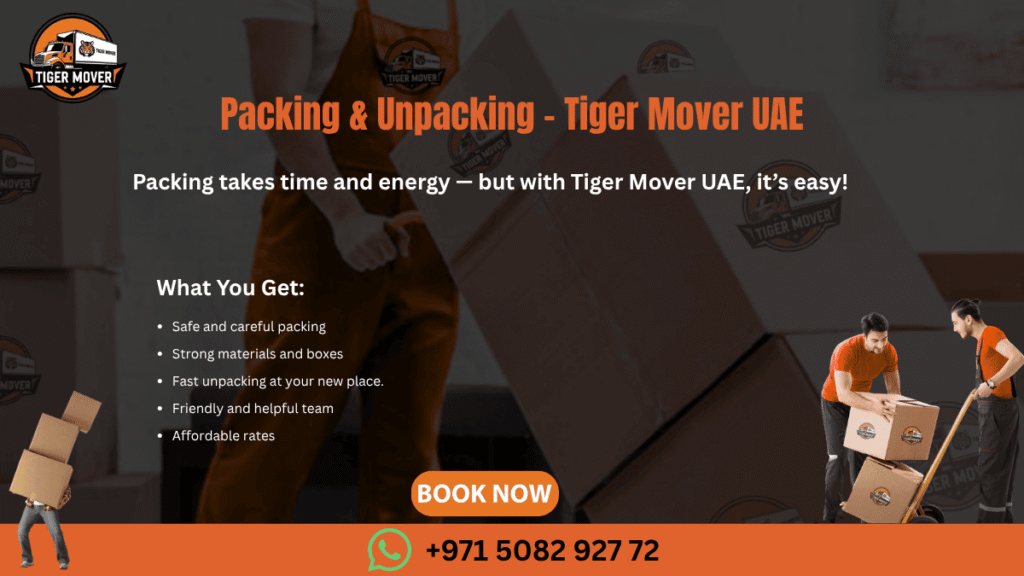 Tiger Mover UAE staff carefully packing fragile items into boxes for a safe move.