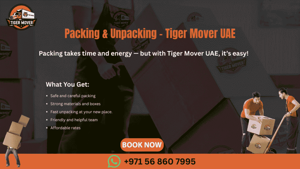 Tiger Mover UAE staff carefully packing fragile items into boxes for a safe move.